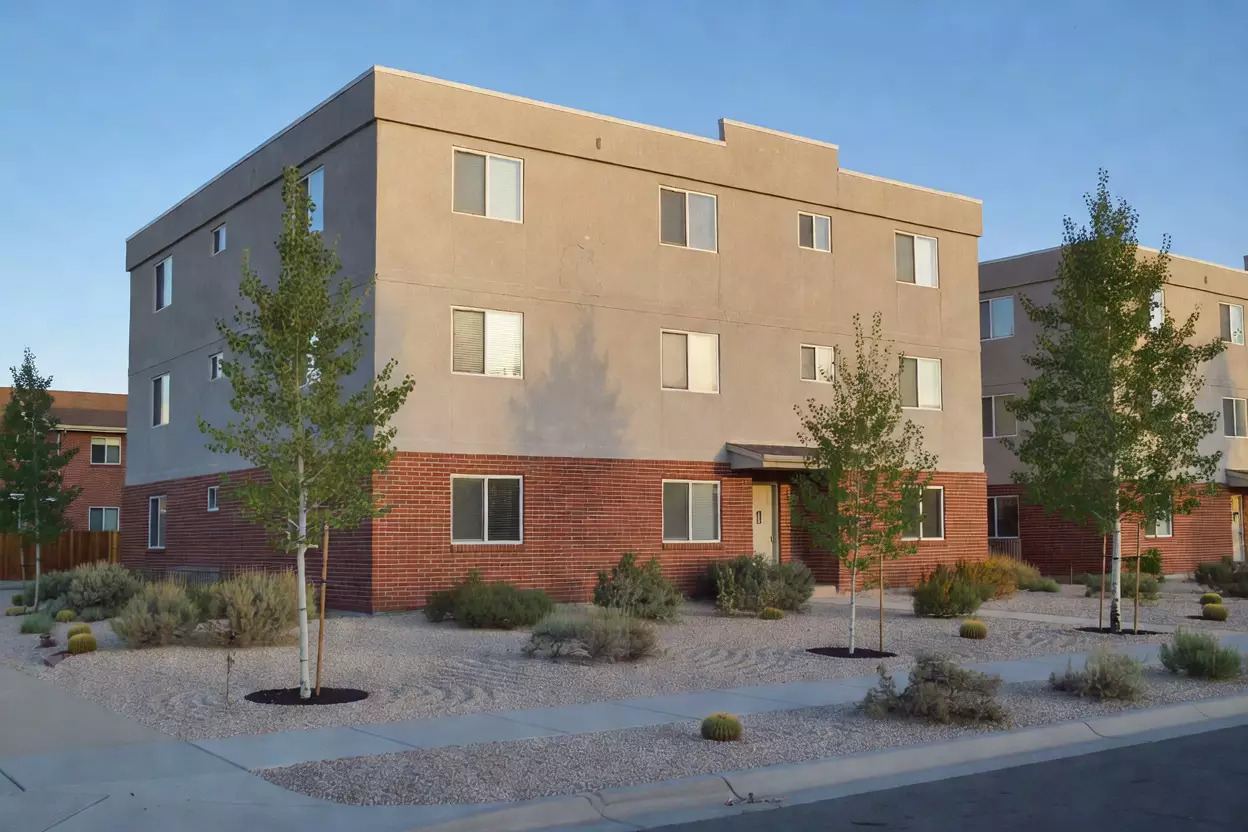 Brick and stucco condominium building on Willow Creek Court